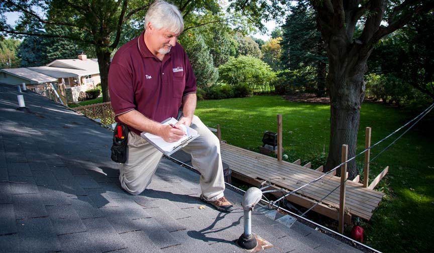 Tim Checking Electrical on Roof Radon & Mold